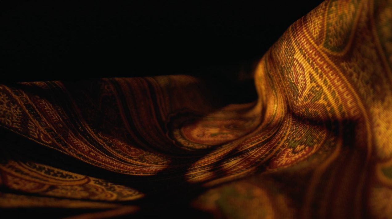 Etro fragrance launch film, a silhouette against paisley silk — image 05